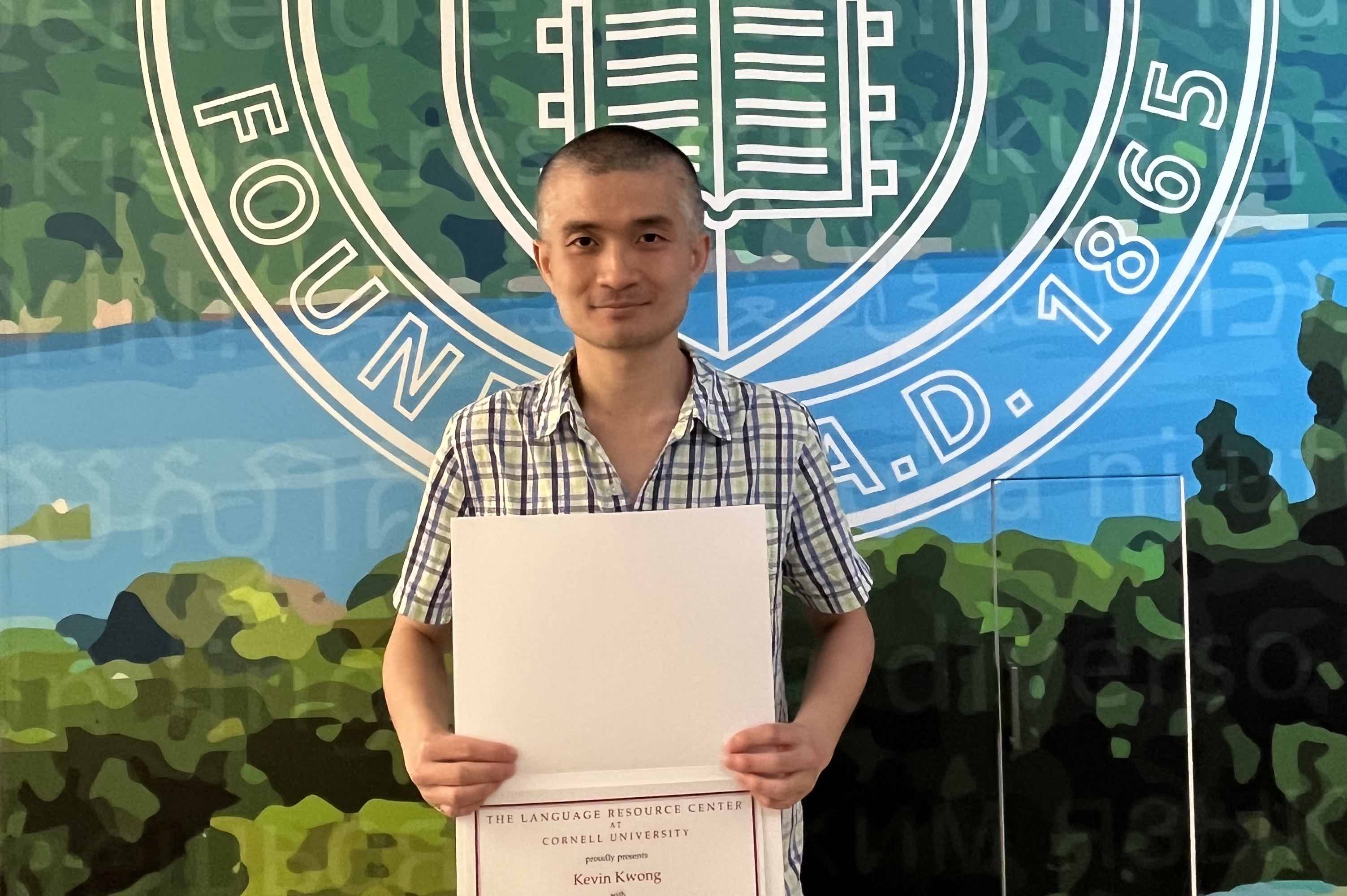 Kevin Kwong holding LSA certificate