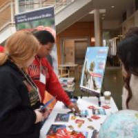 Student participants learning about global resources during the WLD info fair