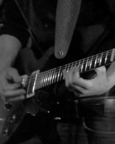 Dan Gaibel playing guitar